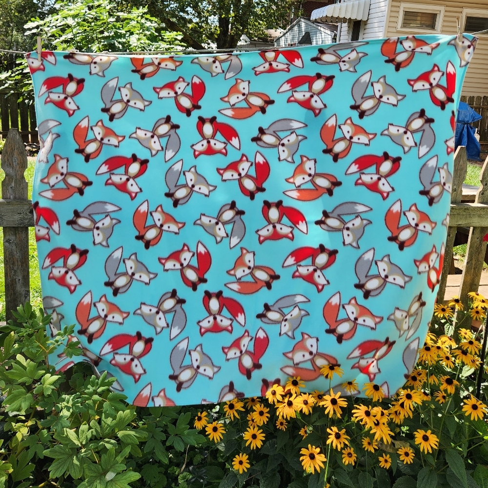 Handmade little foxes fleece blanket
